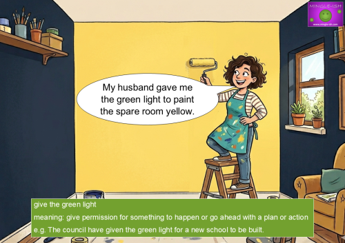 Cartoon illustration of a woman happily painting a room yellow to demonstrate the English idiom 'give the green light'
